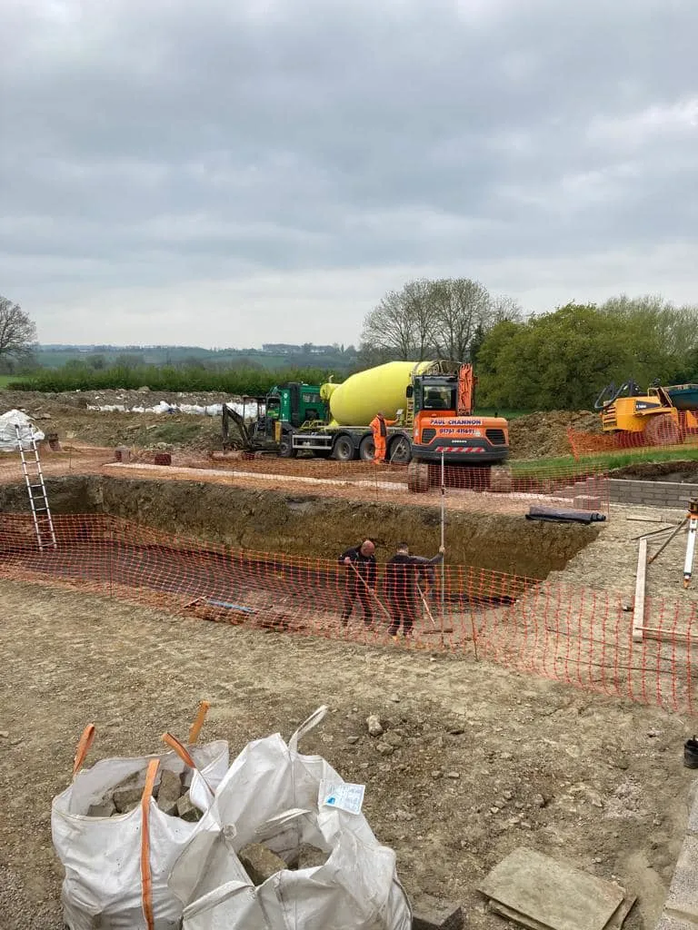 a construction site with construction equipment in the background